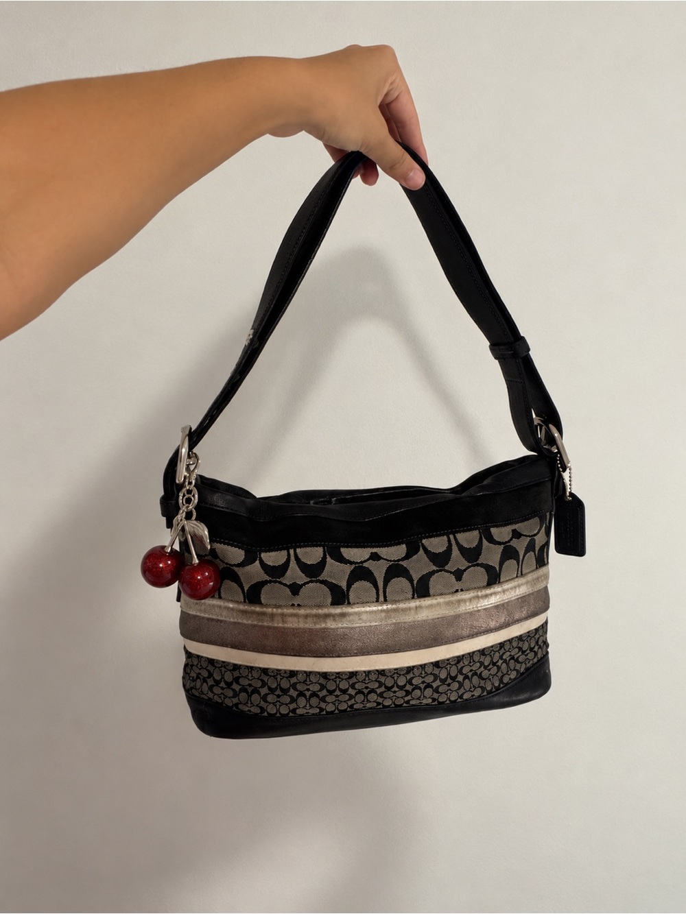 Coach Black and Tan Stripe Accent Shoulder Bag with Cherry Charm